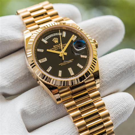 rolex day date gold black dial price